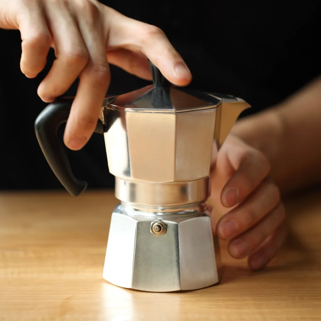 Stovetop espresso coffee measurement guide: Assembling and Heating the Moka Pot
