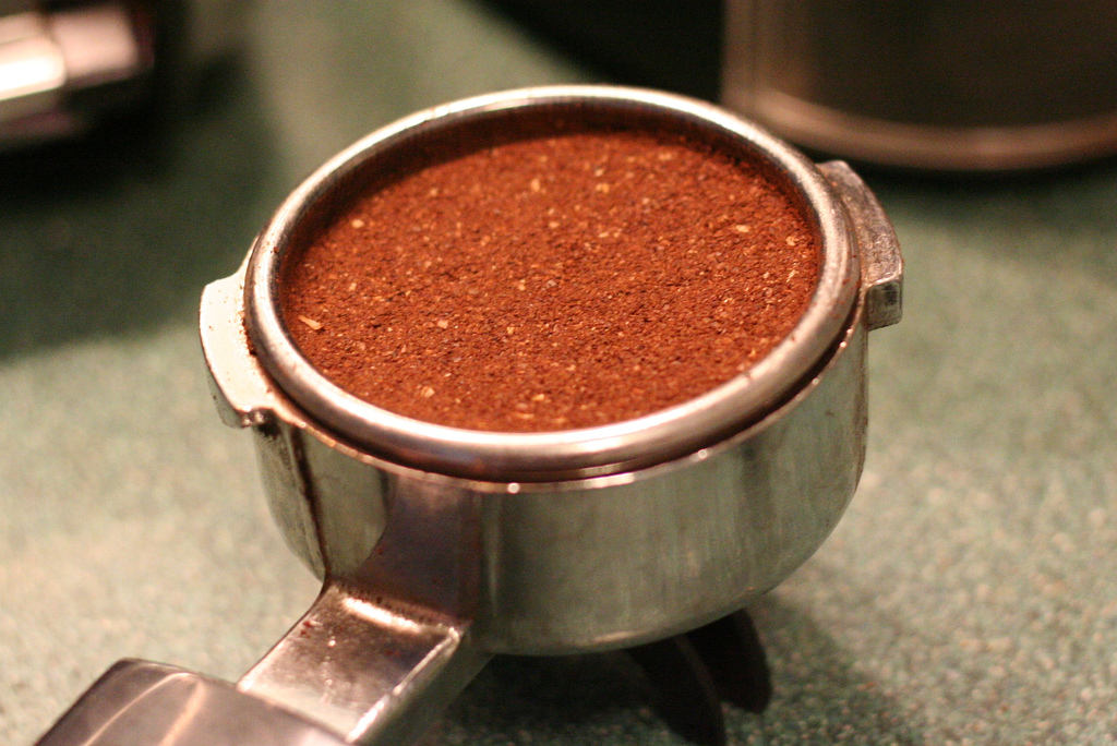 inspect the tamped coffee puck