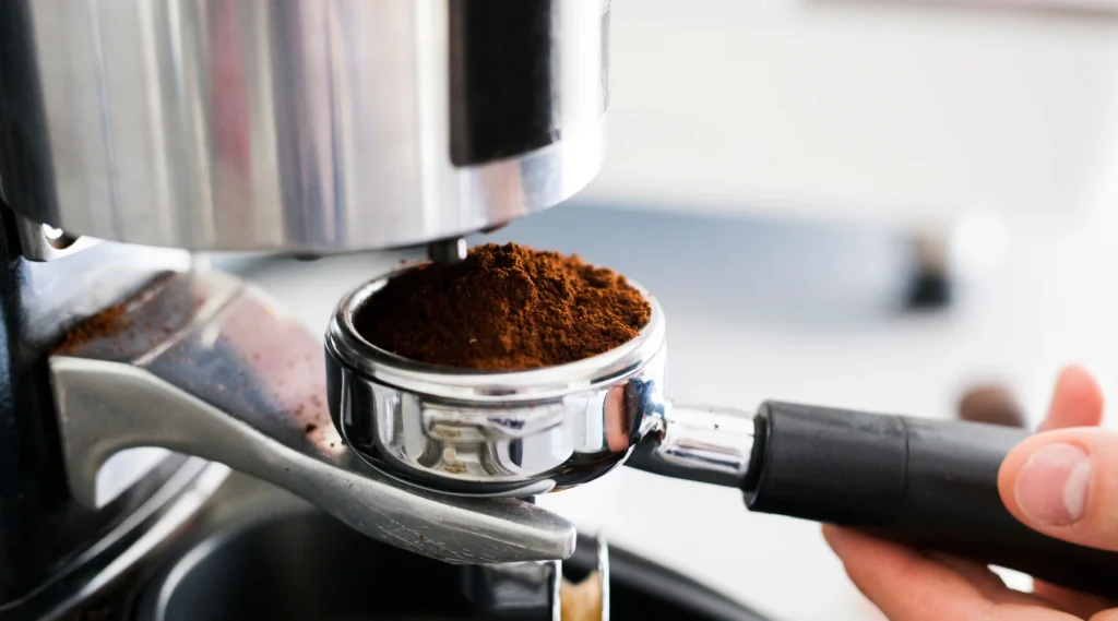 Close-up of ideal espresso grind in a portafilter