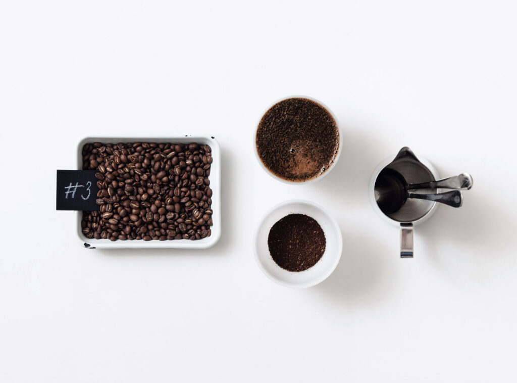 Roaster cupping dark-roasted Sumatra for espresso