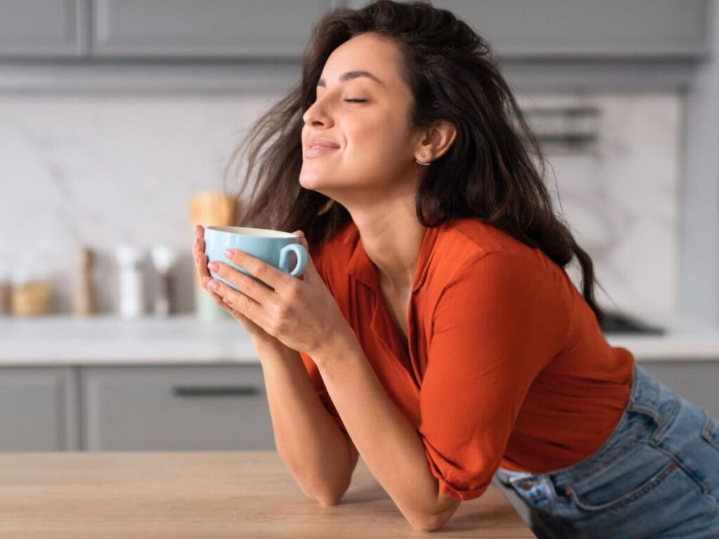 Barista sipping Sumatra shot, nodding in quiet appreciation