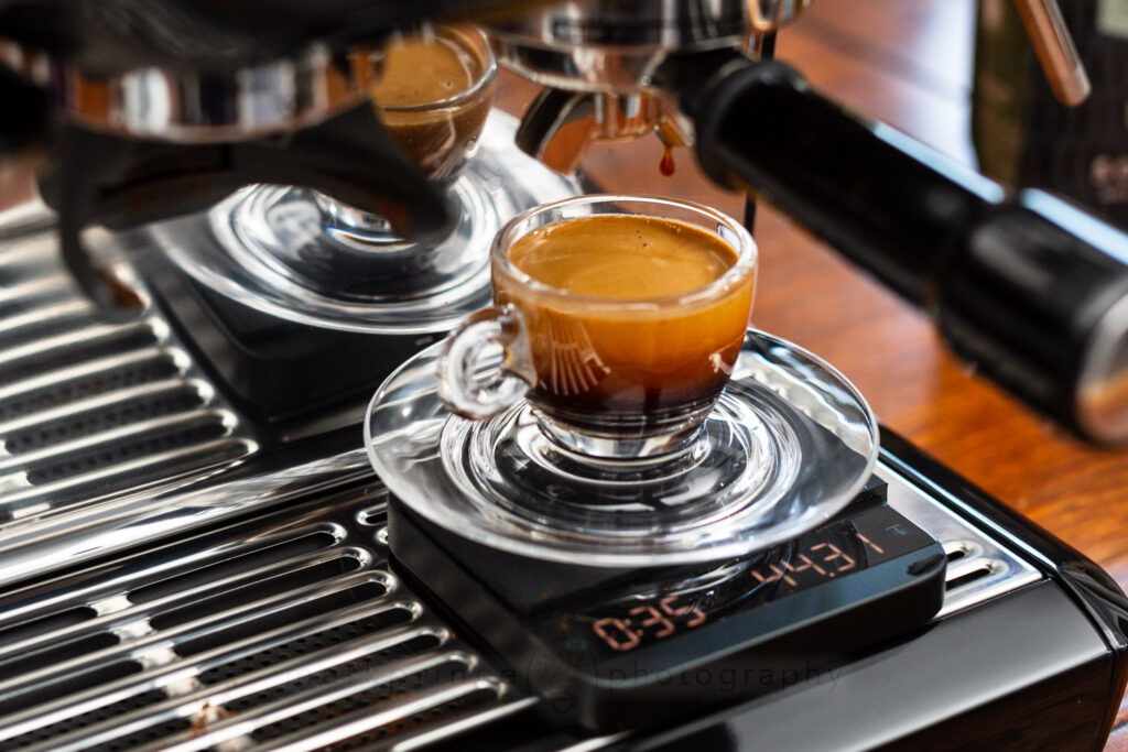 Espresso machine panel showing dose, yield, time