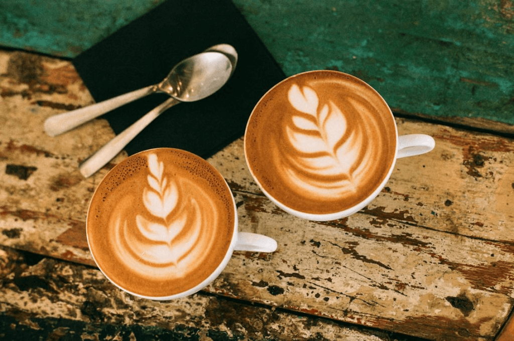 Shot of a cortado made with blend vs straight shot from single origin